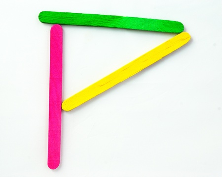 Colorful wood bar separated to P consonant on isolated whiteの写真素材