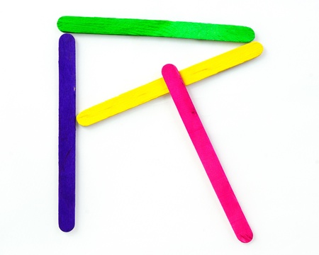 Colorful wood bar separated to R consonant on isolated whiteの写真素材