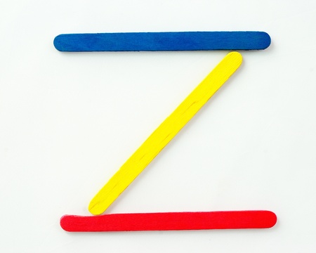 Colorful wood bar separated to Z consonant on isolated whiteの写真素材