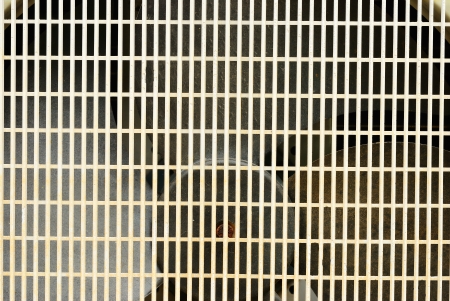 Regtangle old fan cover of air conditioner backgroundの写真素材