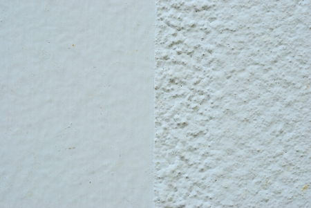 Smoot and rough white concrete wall texture backgroundの写真素材