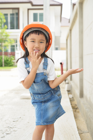 Acting of little engineer feel relax after inspected her siteの写真素材