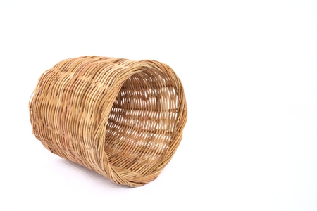 Rattan basket fall on the floorの写真素材