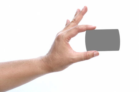 Hand hold the credit card on isolated whiteの写真素材