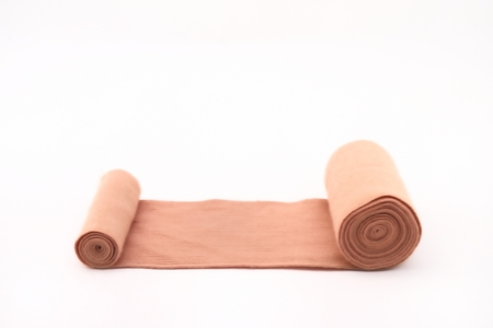 Elastic bandage roll for patient with isolated white backgroundの写真素材
