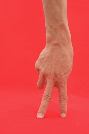 Hand on isolated red for graphic designer