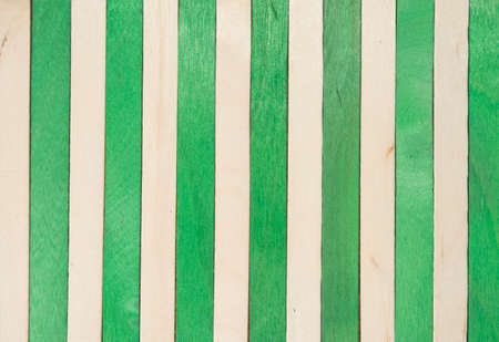 Wood vertical separated on green and original color abstract backgroundの写真素材