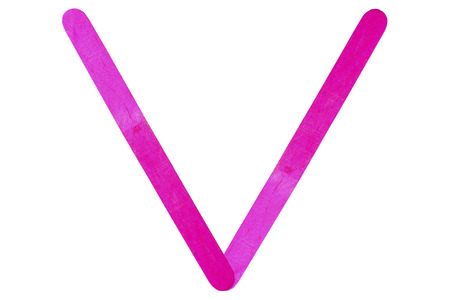 V English alphabet by pink wood on isolated white backgroundの写真素材