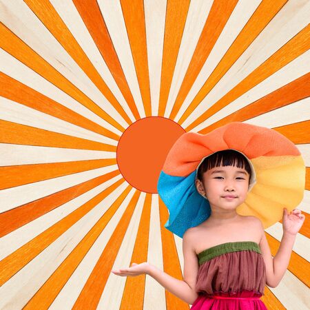 Little girl fashion portrait for summer with orange wood backgroundの写真素材