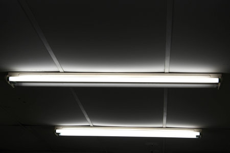 a fluorescent tube mounted on a wallの写真素材