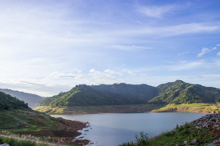 The reservoir is between the valley In Nakhon Nayok, Thailandの写真素材