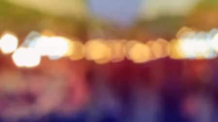 Lights blurred bokeh background in Thailand festival night party, vintage or retro color tonedの写真素材