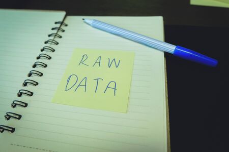 Raw data Post it in the notebook paper with ink pen education. Office suppliesの写真素材