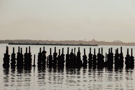 Old car tires, made into a wave barrier, Warm tone