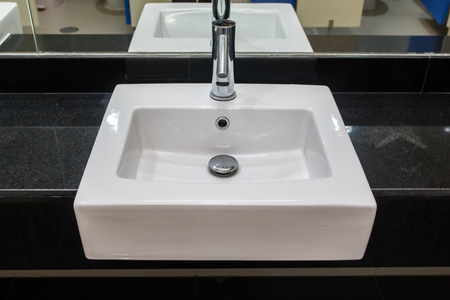 Bathroom interior with white wash basin and faucet modern.の写真素材