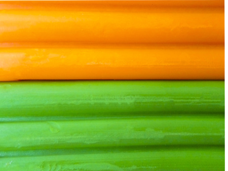 Plasticine background, green and orange, horizontal linesの写真素材