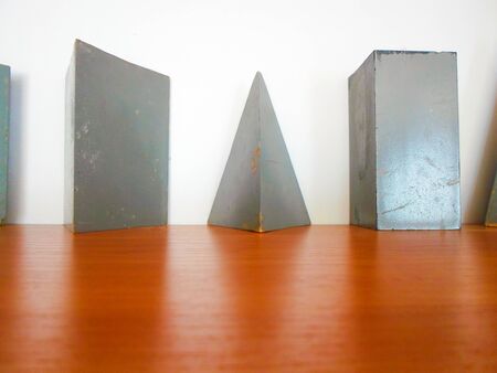 geometric shapes on a wooden shelfの写真素材