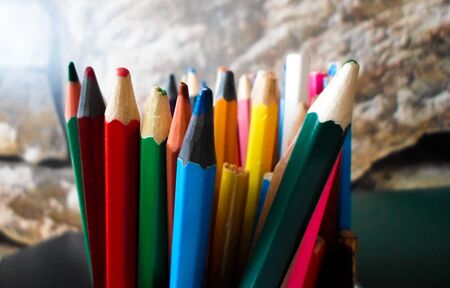 Multi-colored pencils on the background of stones. Back to Schoolの写真素材