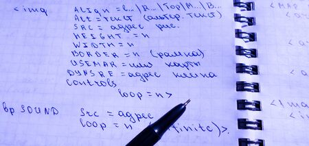 Java program in notepad and black pen. creation of computer programs. work of the programmer and system administratorの写真素材