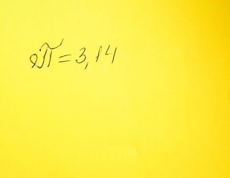 The number pi is written in a notebook with a pen or marker. Pi day number concept. pi is 3.14