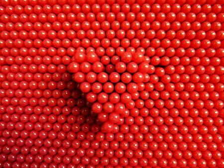 Heart shape by plastic pin board toy.