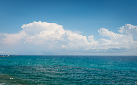 Ligurian Sea. Seascape Italy. White clouds on a blue sky. Great summer vacation day.の写真素材