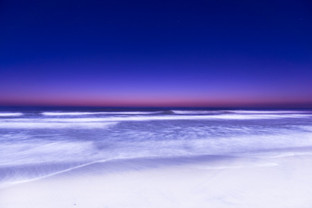 Night Surf Ocean Beach in San Diego. Long exposure.の写真素材