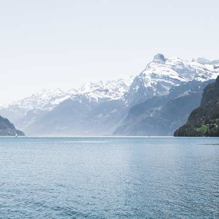 Air background. Ridge Mountains. Tops in snow. Lake Lucerne. Switzerland. Wide-Angle Lensの写真素材