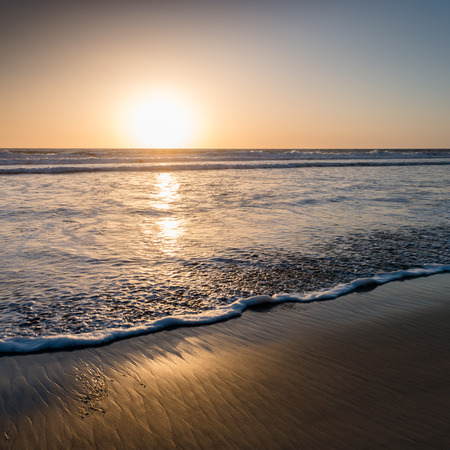 Sunset over the ocean. San Diego beach.の写真素材