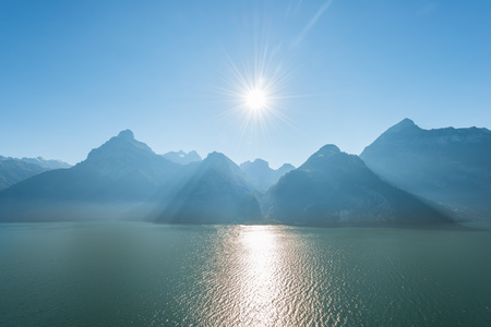 Mountain landscape. Sunny bright day. Against the background of a mountain lake.の写真素材