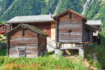 Sun-burnt wooden chalets in Valais, Swiss Alps traditional village Belalpのeditorial素材