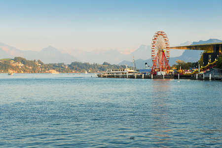 City of Lucerne. Amusement park with a Ferris wheel. Shore of the lake, autumn. Filter softlightのeditorial素材