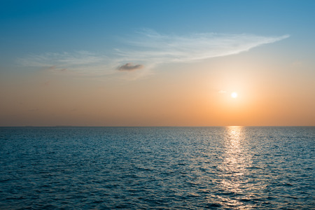 Sunset over the ocean. Maldivesの写真素材