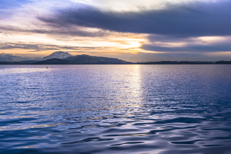 Sunset Lake. On a background the mountains. Play of light and shadow creates a gorgeous volume and distance.の写真素材