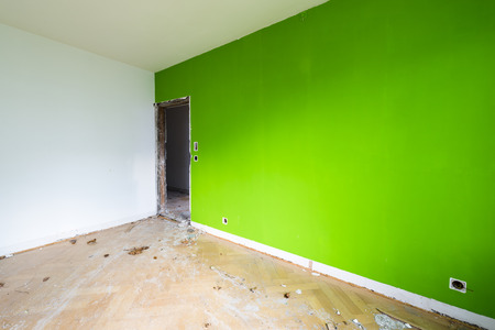 Room in house that no longer exists. Disorder, chaos, debris and dirt in an abandoned room for demolition.の写真素材