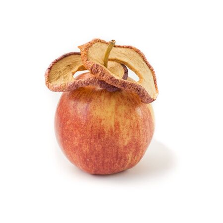 Fresh apple and dried apples slices.  Storing vitamins for the winter and spring period. Healthy food. Isolated objects on a white background.の写真素材