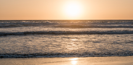 Ocean and beach at sunset. California Coast. Abstract seascape background. Original film shot.の写真素材