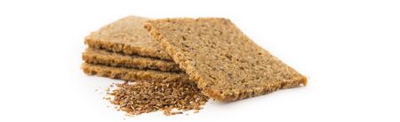Organic Rye Bread with Flax, Sesame Seeds. Selective focus on foreground. Close Up. Isolated objects on a white background.の写真素材