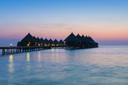 Luxus Resort in the Maldives. Grand sunset over the Indian Ocean. Evening for relaxation and enjoyment.のeditorial素材
