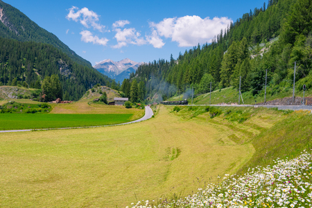 Journey by the historic steam  train to Grisons, Swiss Alpsの写真素材