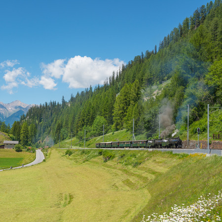 Journey by the historic steam  train to Grisons, Swiss Alpsの写真素材