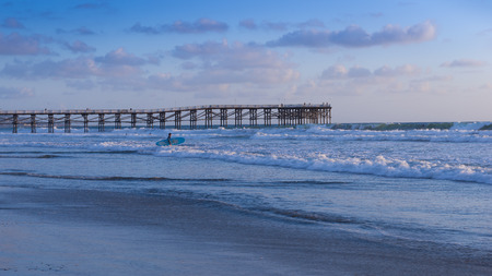 California coast. San Diego beach at sunset. Ocean Waves rolled on the sandの写真素材
