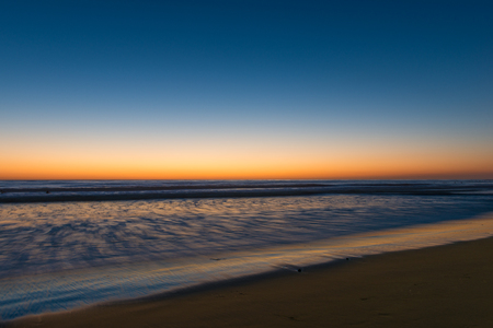 Beach and surf of the ocean at night. Long exposureの写真素材
