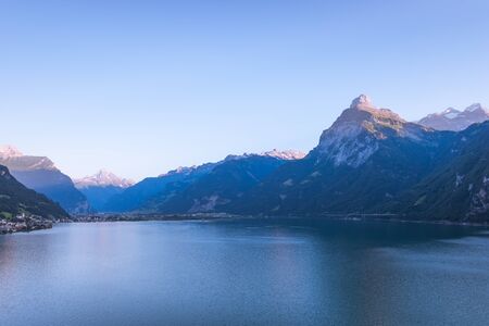 Mmountain range of the Alps. Foehn wind over the lake.  Grandiose volumetric  panorama.の写真素材