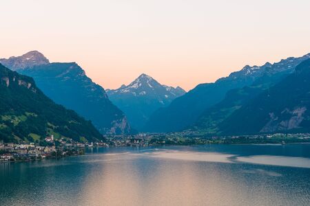 Mmountain range of the Alps. Foehn wind over the lake.  Grandiose volumetric  panorama.の写真素材