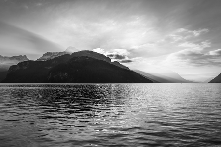 Sunset over the mountain ridge. Extra wide lens. Black and White.の写真素材