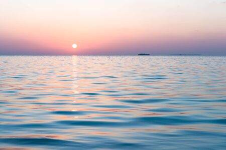 Sunset on a tropical island. Relax evening in the Maldives.の写真素材