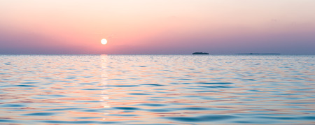 Sunset on a tropical island. Relax evening in the Maldives.の写真素材