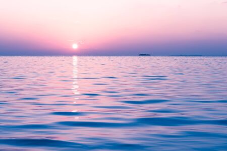 Fantastic color of sunset on a tropical island. Relax evening in the Maldives.の写真素材