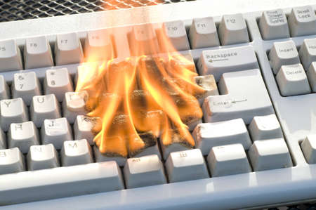 computer keyboard in fireの写真素材
